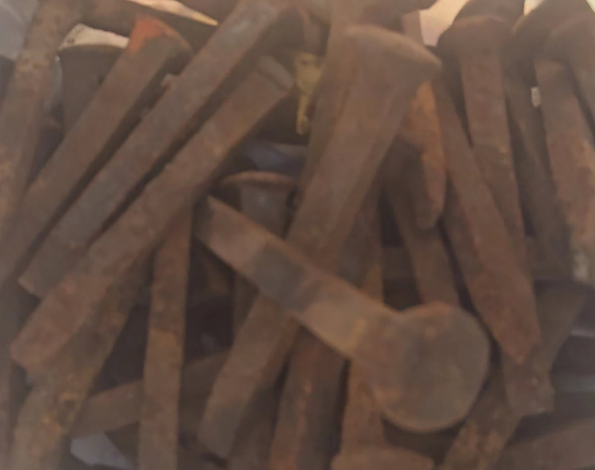 Rustic railroad spikes for protection and empowerment, ideal for hoodoo practices.
