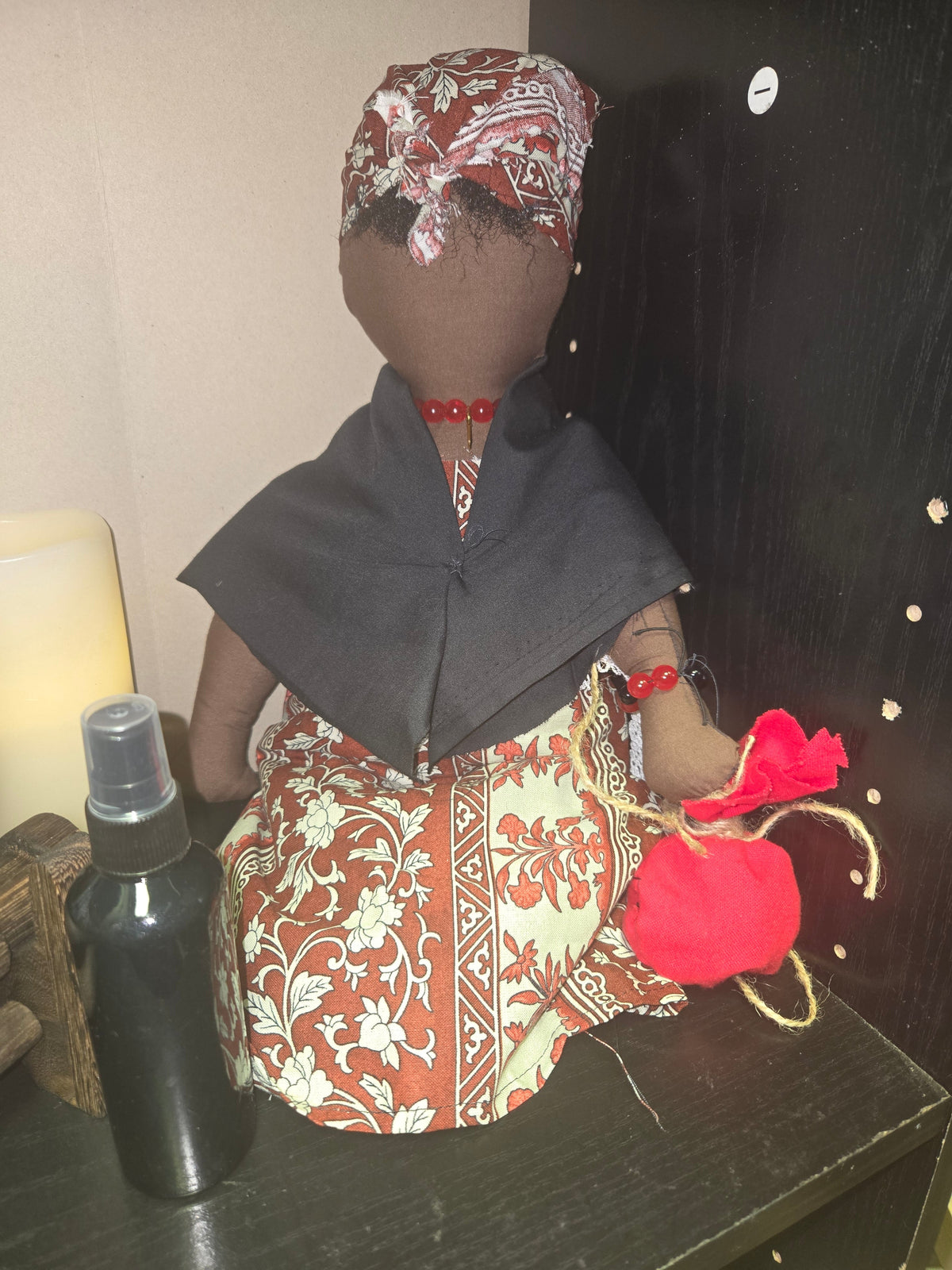 Big Mama ancestor doll representing someone who needs support, focusing on their well-being.
