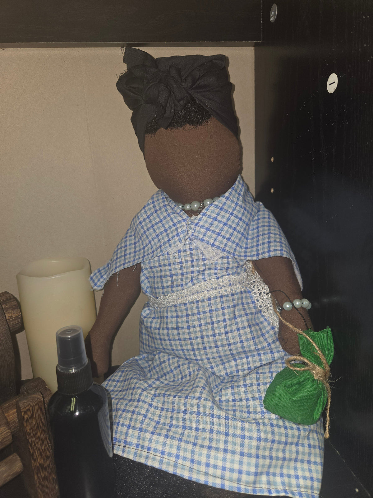 Big Mama ancestor doll representing someone who needs support, focusing on their well-being.