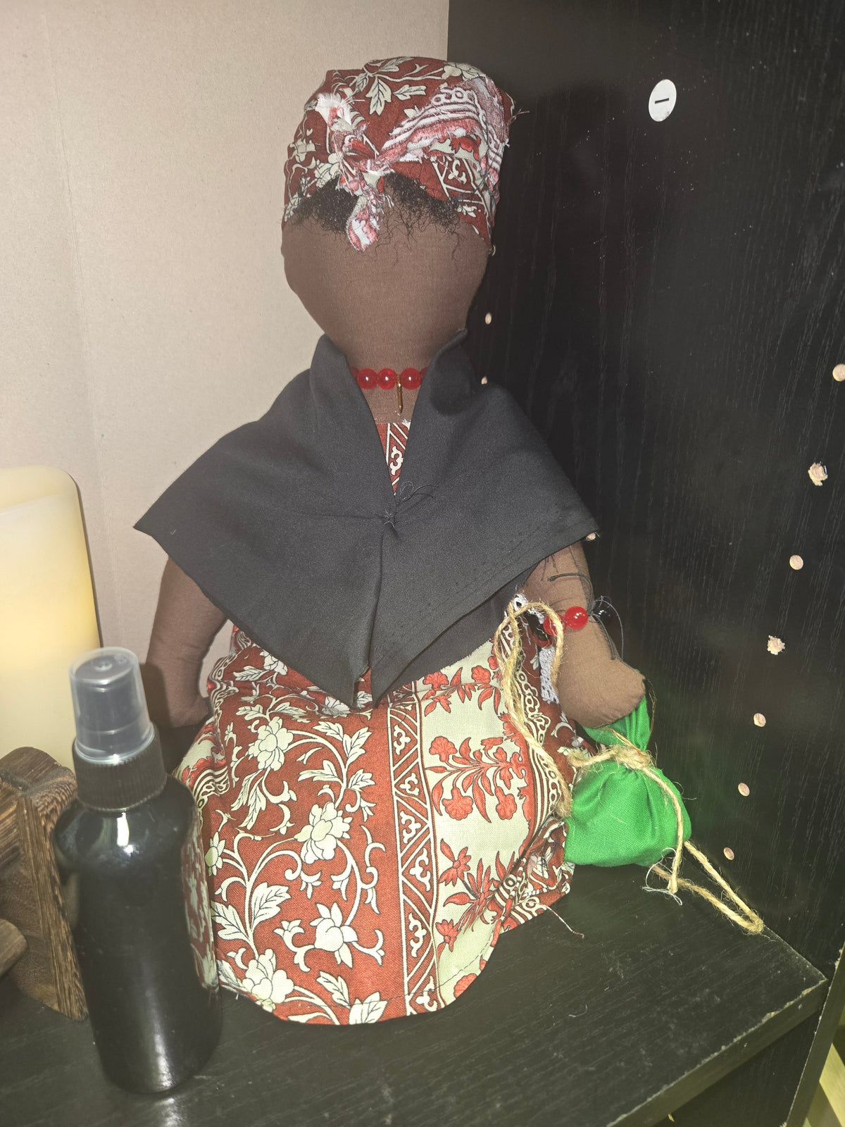 Big Mama ancestor doll representing someone who needs support, focusing on their well-being.