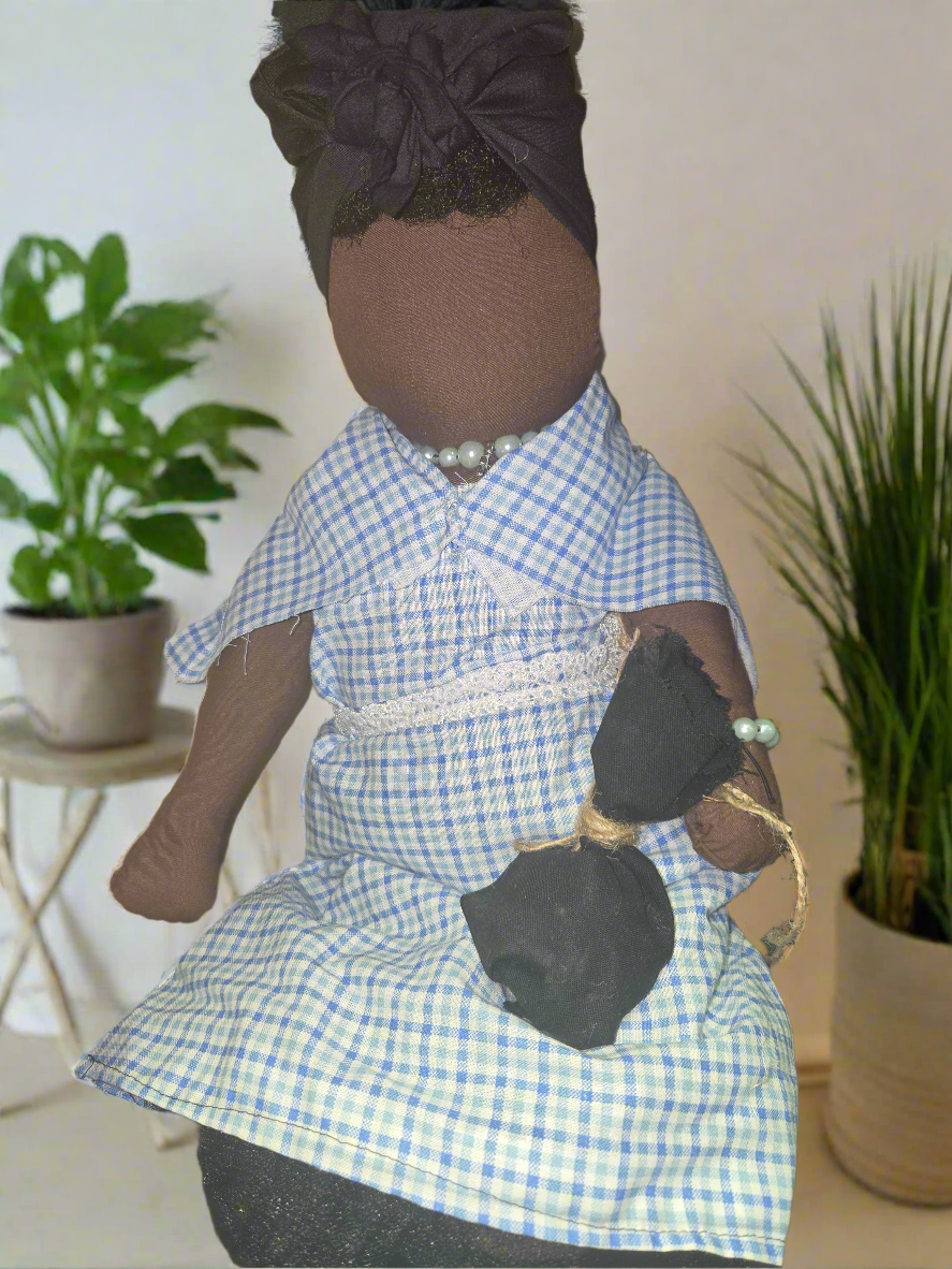 Big Mama ancestor doll  representing someone who needs support, focusing on their well-being.