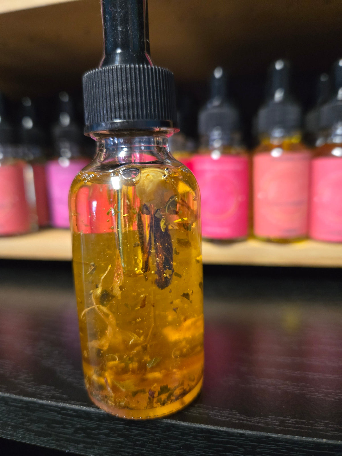 Hoodoo Jezebel Oil 0.5 oz bottle for enhancing magnetism and seduction with handcrafted spiritual attraction blend