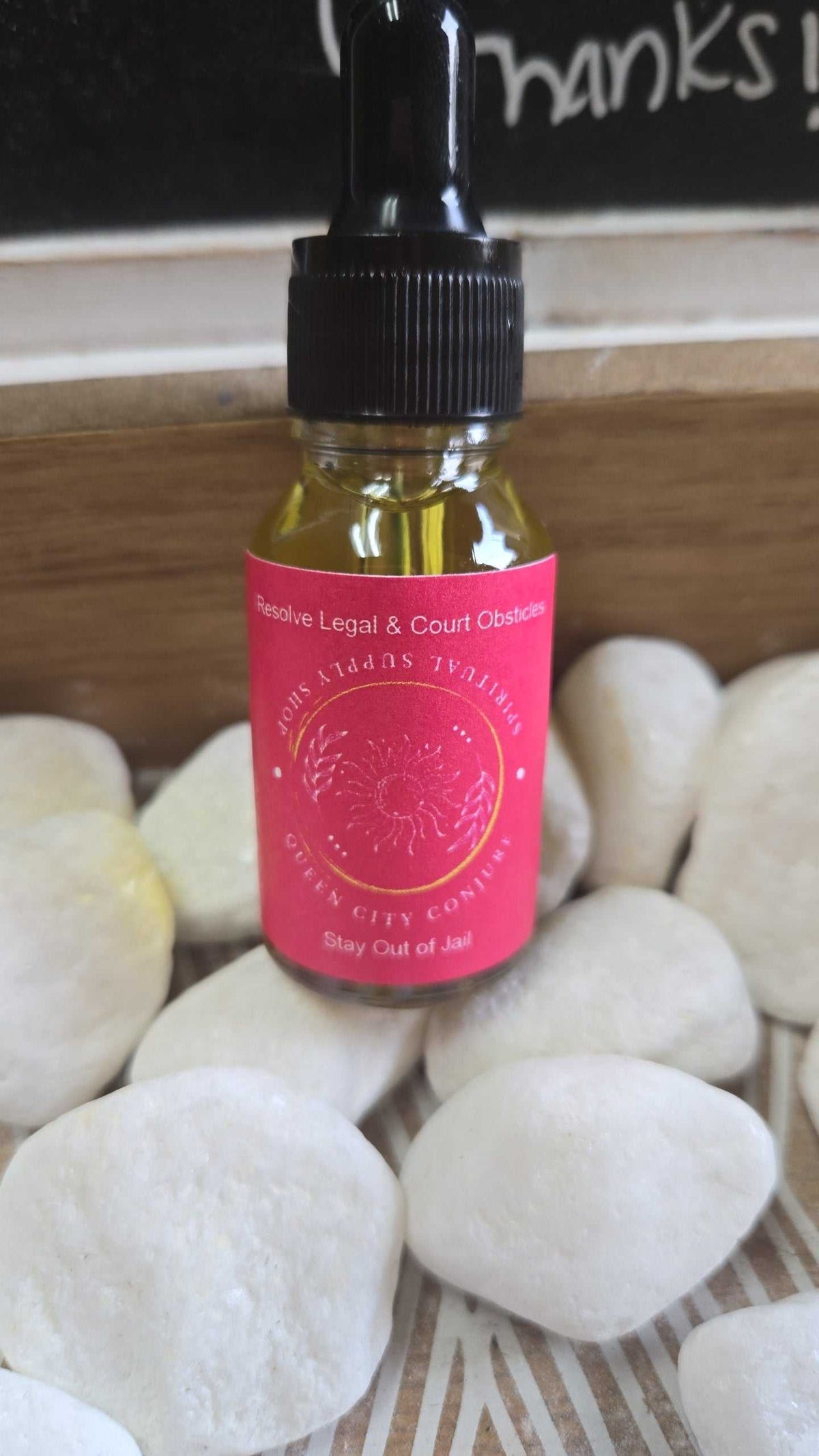 Stay Out of Jail conjure oil bottle for legal protection and peace of mind.